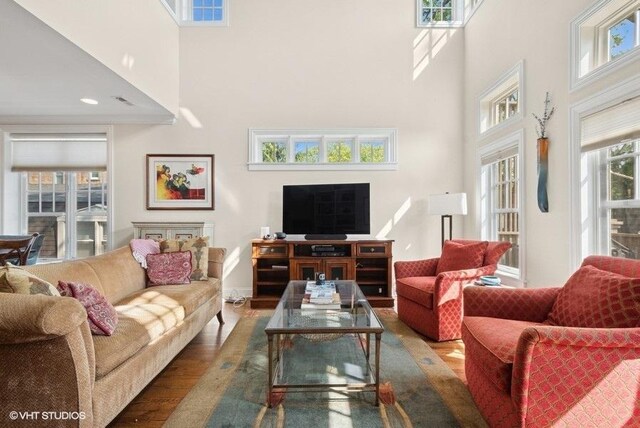 2642 Prairie Ave Unit 2, Evanston, IL 60201 - living room featuring a high ceiling and wood finished floors