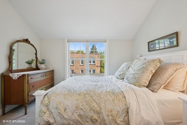 2642 Prairie Ave Unit 2, Evanston, IL 60201 - bedroom with lofted ceiling and carpet floors