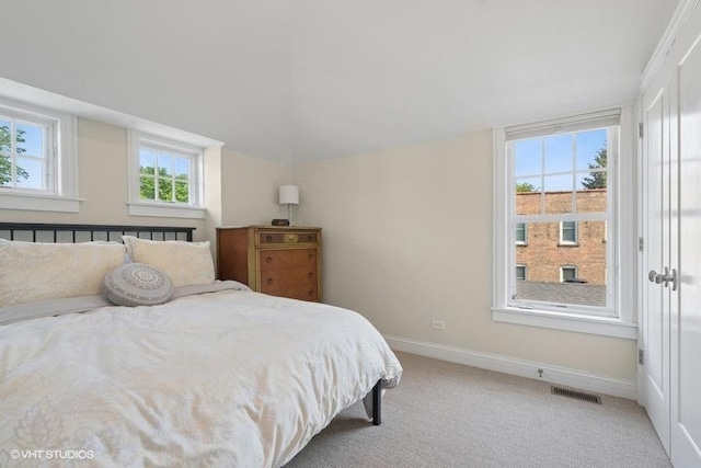 2642 Prairie Ave Unit 2, Evanston, IL 60201 - bedroom with baseboards and light colored carpet
