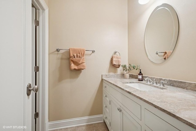 2642 Prairie Ave Unit 2, Evanston, IL 60201 - bathroom with vanity and baseboards
