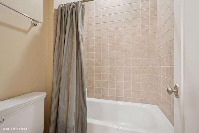 2642 Prairie Ave Unit 2, Evanston, IL 60201 - bathroom with toilet and shower / tub combo with curtain