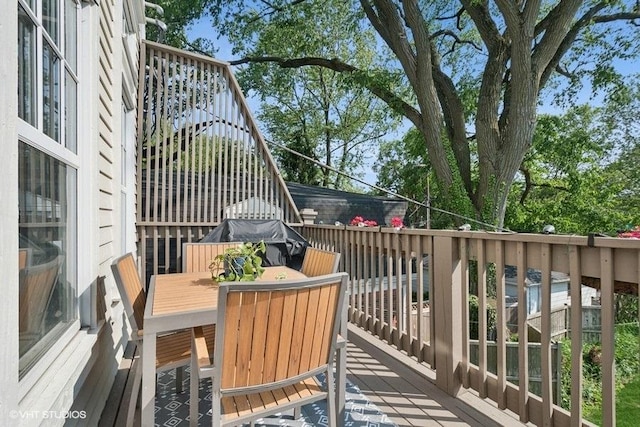 2642 Prairie Ave Unit 2, Evanston, IL 60201 - wooden terrace with outdoor dining space