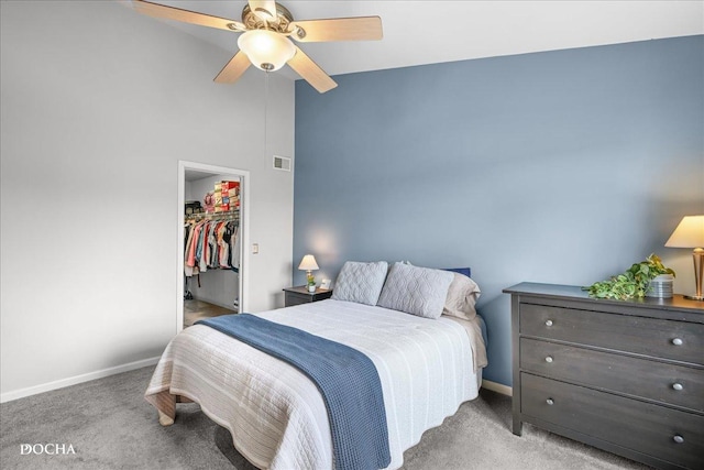 1944 Indian Hill Ln, Aurora, IL 60503 - bedroom featuring carpet floors, a walk in closet, a closet, vaulted ceiling, and a ceiling fan