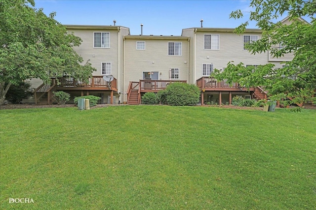 1944 Indian Hill Ln, Aurora, IL 60503 - rear view of property with stairs, a wooden deck, and a yard