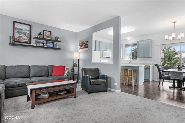 1944 Indian Hill Ln, Aurora, IL 60503 - living room featuring a chandelier and dark colored carpet