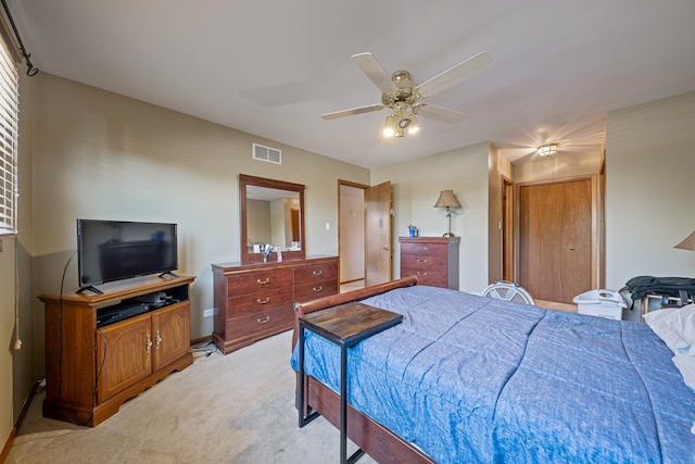 7749 W Lakeview Ter, Frankfort, IL 60423 - bedroom with light colored carpet, ceiling fan, and a closet