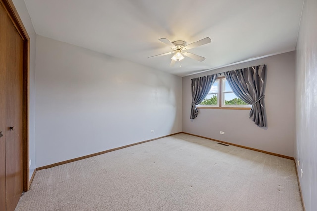 7749 W Lakeview Ter, Frankfort, IL 60423 - spare room with light colored carpet and a ceiling fan