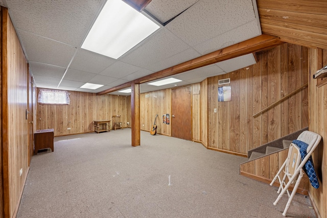 7749 W Lakeview Ter, Frankfort, IL 60423 - basement with wooden walls, a paneled ceiling, stairs, and carpet flooring