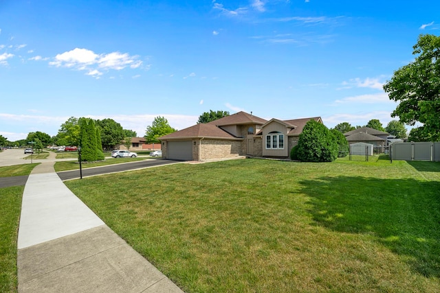 7749 W Lakeview Ter, Frankfort, IL 60423 - view of front of home with asphalt driveway, an attached garage, a gate, and brick siding