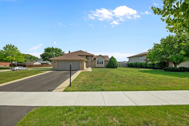 7749 W Lakeview Ter, Frankfort, IL 60423 - single story home featuring asphalt driveway, a front lawn, an attached garage, and brick siding