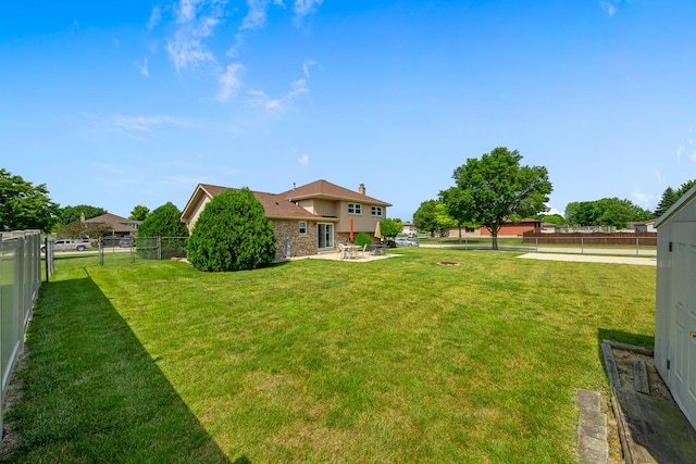 7749 W Lakeview Ter, Frankfort, IL 60423 - fenced backyard with a patio area