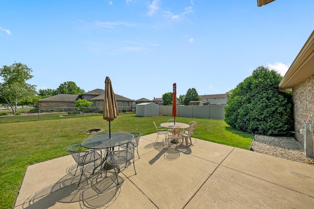 7749 W Lakeview Ter, Frankfort, IL 60423 - fenced backyard with outdoor dining space, a shed, and a patio area