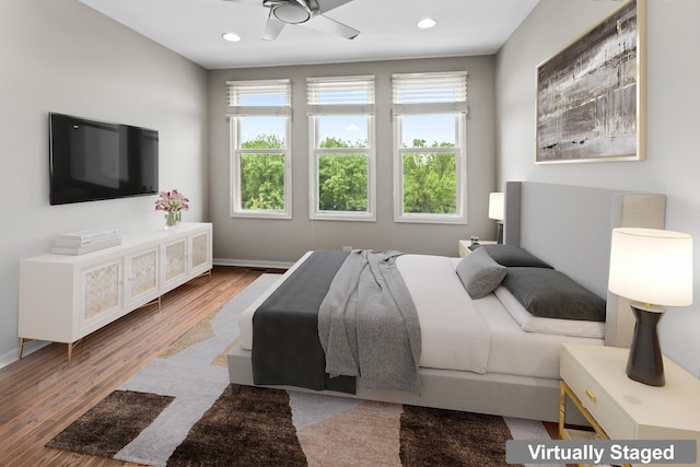 319 W Wood St Unit 18, Palatine, IL 60067 - bedroom with multiple windows, wood finished floors, and recessed lighting