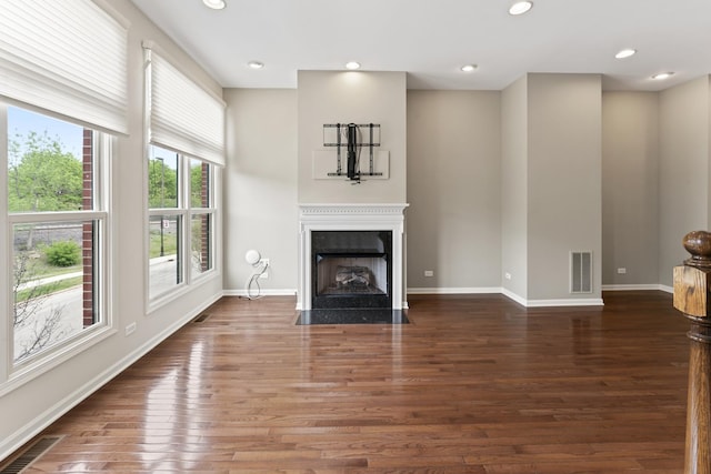 319 W Wood St Unit 18, Palatine, IL 60067 - unfurnished living room featuring a fireplace with flush hearth, wood finished floors, and recessed lighting
