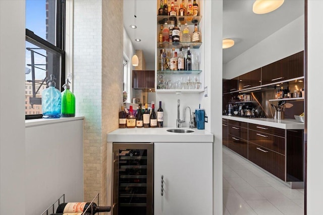 5510 N Sheridan Rd Unit 17A, Chicago, IL 60640 - indoor wet bar with beverage cooler, light tile patterned floors, and brick wall