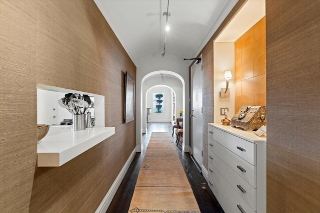 5510 N Sheridan Rd Unit 17A, Chicago, IL 60640 - corridor with arched walkways, vaulted ceiling, and dark wood-type flooring