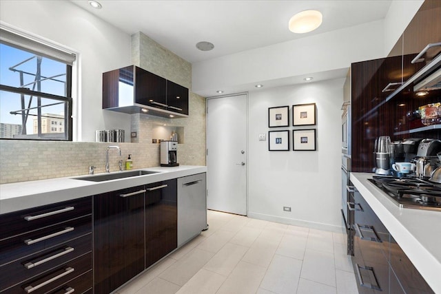 5510 N Sheridan Rd Unit 17A, Chicago, IL 60640 - kitchen featuring dishwasher, modern cabinets, gas cooktop, light countertops, and decorative backsplash
