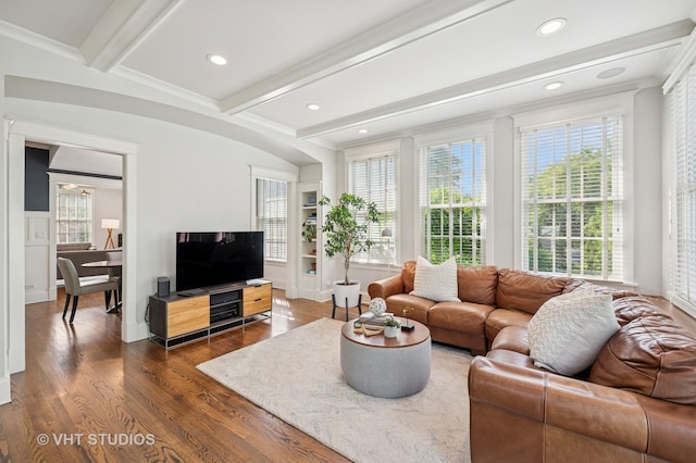 625 Park Ave, Wilmette, IL 60091 - living area with dark wood finished floors, healthy amount of natural light, beamed ceiling, recessed lighting, and ornamental molding