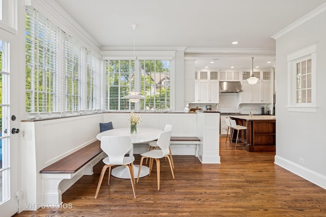625 Park Ave, Wilmette, IL 60091 - dining space featuring breakfast area, ornamental molding, and dark wood finished floors