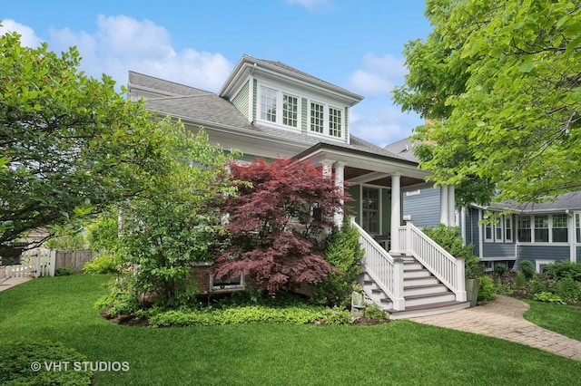 625 Park Ave, Wilmette, IL 60091 - view of front of house with roof with shingles and covered porch