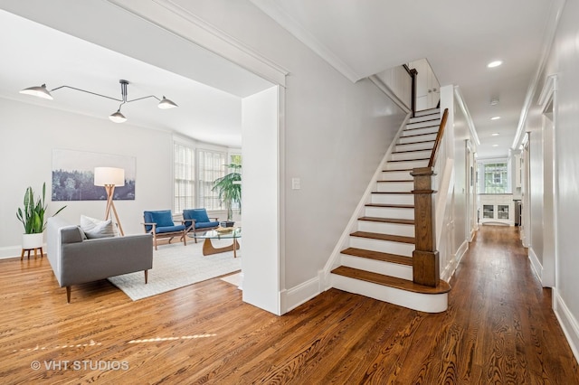 625 Park Ave, Wilmette, IL 60091 - stairway featuring healthy amount of natural light, wood finished floors, and recessed lighting