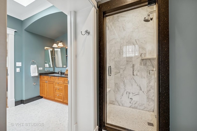 625 Park Ave, Wilmette, IL 60091 - full bath featuring a marble finish shower, vanity, and crown molding