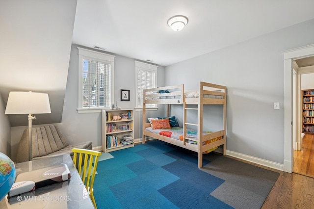 625 Park Ave, Wilmette, IL 60091 - bedroom with baseboards and wood finished floors
