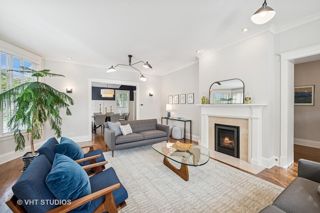 625 Park Ave, Wilmette, IL 60091 - living area featuring ornamental molding, a fireplace with flush hearth, wood finished floors, and recessed lighting