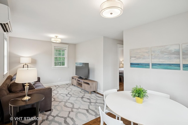 625 Park Ave, Wilmette, IL 60091 - living room with an AC wall unit and baseboards