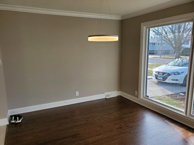 542 Laramie Ave, Wilmette, IL 60091 - unfurnished dining area featuring ornamental molding and dark wood-type flooring