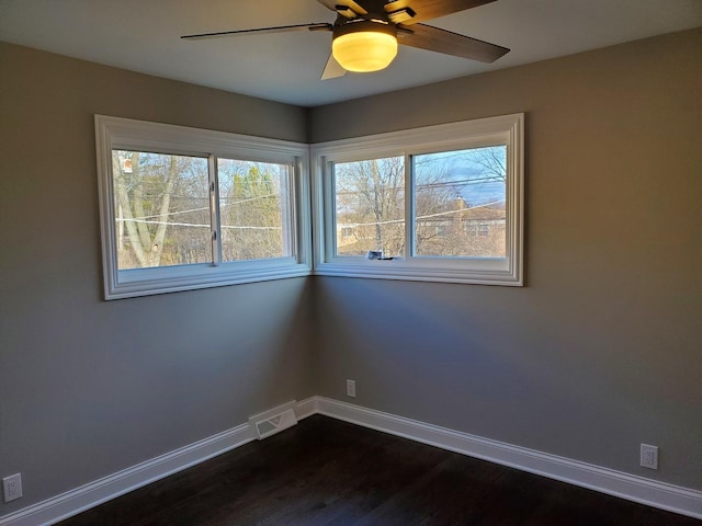 542 Laramie Ave, Wilmette, IL 60091 - empty room featuring dark wood-style flooring and ceiling fan