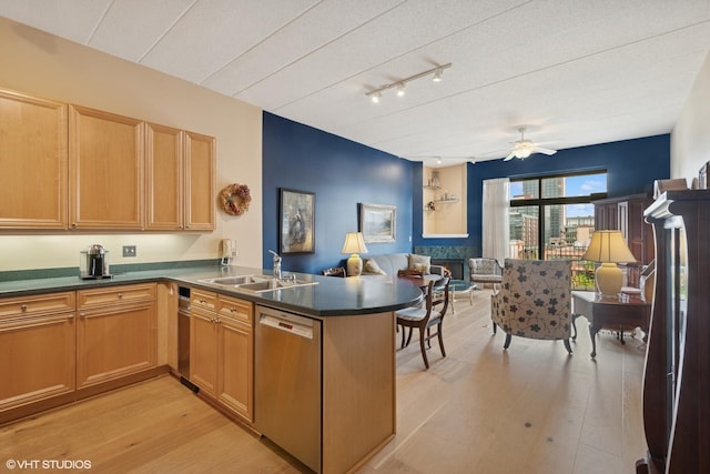 1301 W Washington Blvd Unit 509, Chicago, IL 60607 - kitchen with dishwasher, a peninsula, light wood finished floors, open floor plan, and dark countertops