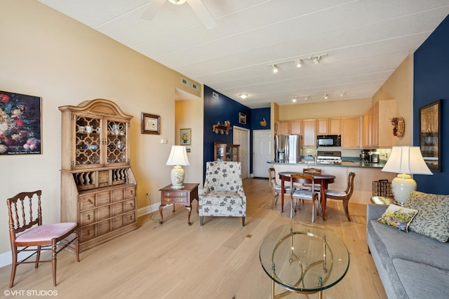 1301 W Washington Blvd Unit 509, Chicago, IL 60607 - living room featuring track lighting, light wood finished floors, and ceiling fan
