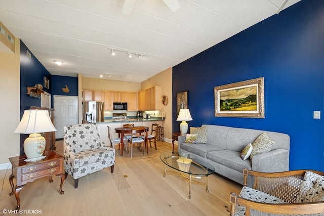 1301 W Washington Blvd Unit 509, Chicago, IL 60607 - living area with light wood-style floors and rail lighting