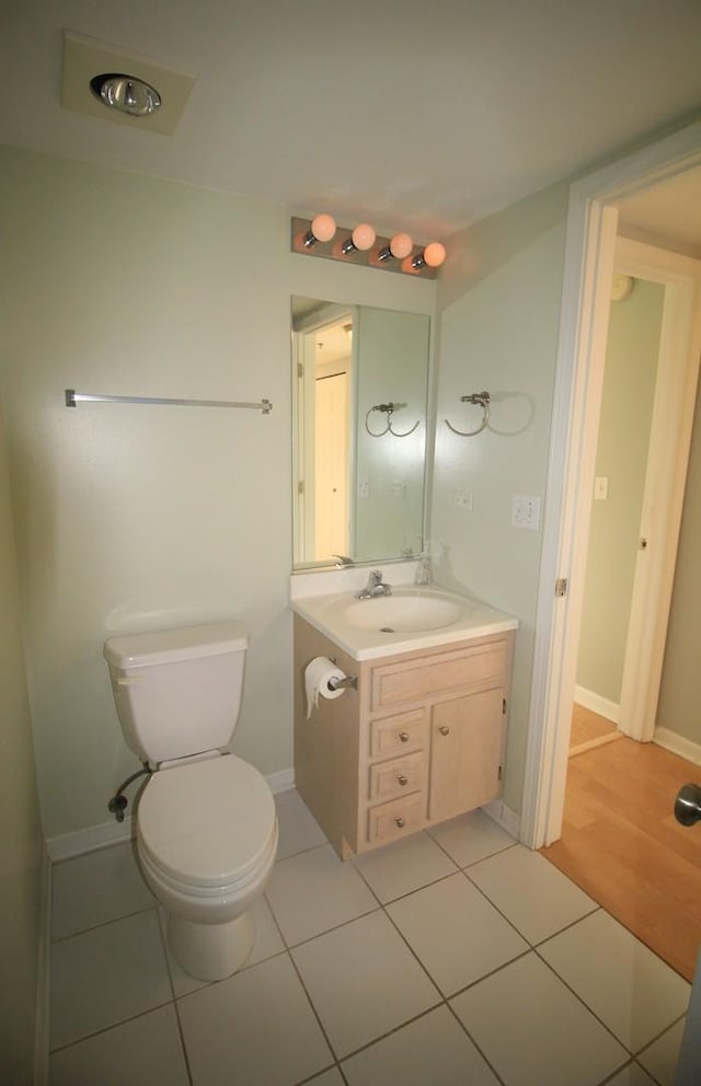 7335 Oakwood Ave Unit 4F, Lyons, IL 60534 - half bath with vanity and tile patterned floors