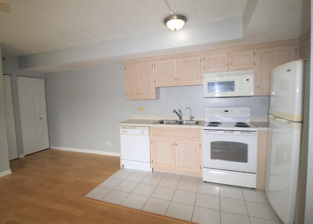 7335 Oakwood Ave Unit 4F, Lyons, IL 60534 - kitchen with white appliances, light countertops, and light brown cabinets