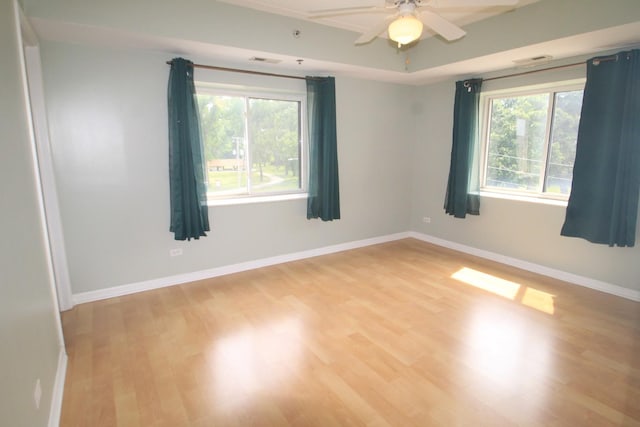 7335 Oakwood Ave Unit 4F, Lyons, IL 60534 - empty room featuring light wood-style flooring and a ceiling fan