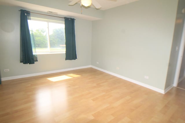 7335 Oakwood Ave Unit 4F, Lyons, IL 60534 - unfurnished room featuring ceiling fan and light wood-type flooring