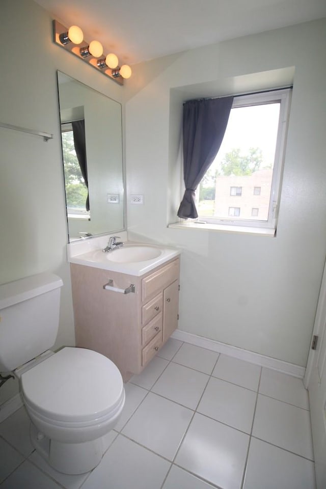 7335 Oakwood Ave Unit 4F, Lyons, IL 60534 - half bathroom featuring vanity and tile patterned flooring