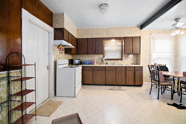 125 S Main St, Clifton, IL 60927 - kitchen featuring electric stove, under cabinet range hood, light countertops, light flooring, and dark brown cabinetry