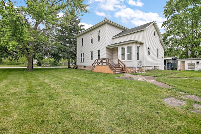 125 S Main St, Clifton, IL 60927 - back of property with a yard