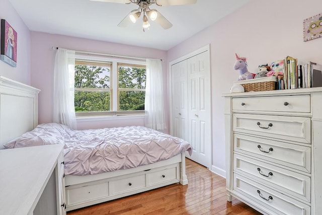 15005 131st St, Lemont, IL 60439 - bedroom with light wood-style floors, a closet, and a ceiling fan