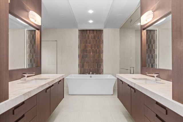 326 Country Ln, Glenview, IL 60025 - full bath with a soaking tub, two vanities, tile patterned flooring, and tile walls