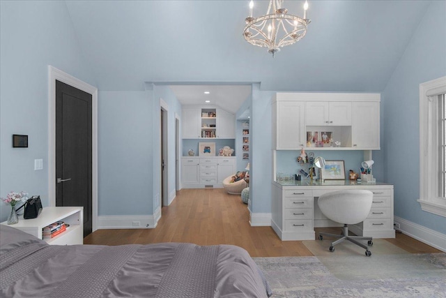 326 Country Ln, Glenview, IL 60025 - bedroom with light wood-type flooring, a chandelier, vaulted ceiling, and built in study area