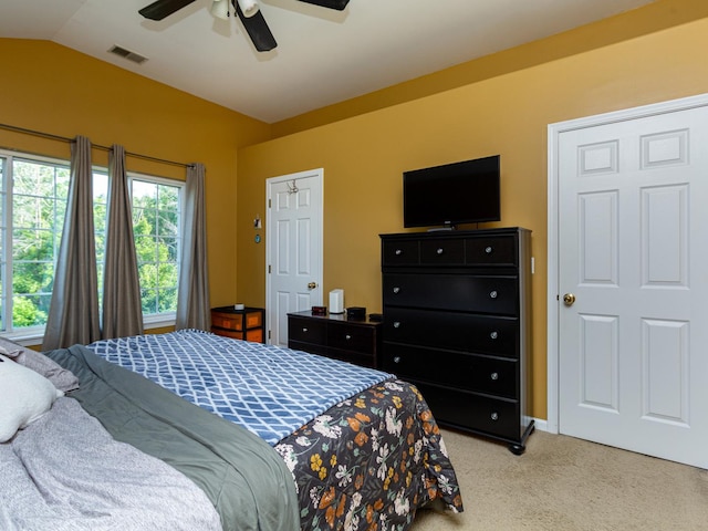 7367 Grandview Ct Unit 7367, Carpentersville, IL 60110 - bedroom with light colored carpet, vaulted ceiling, and a ceiling fan