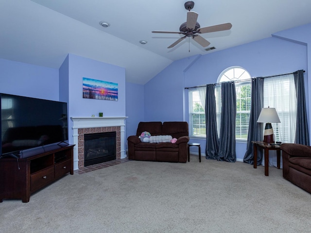 7367 Grandview Ct Unit 7367, Carpentersville, IL 60110 - living room featuring carpet, a fireplace, vaulted ceiling, and a ceiling fan
