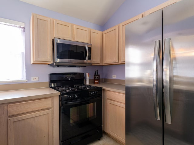 7367 Grandview Ct Unit 7367, Carpentersville, IL 60110 - kitchen with stainless steel appliances, light brown cabinets, light countertops, and vaulted ceiling