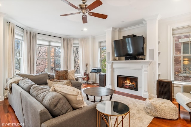 3019 W Cornelia Ave, Chicago, IL 60618 - living area with ornamental molding, dark wood-style floors, a ceiling fan, a lit fireplace, and recessed lighting