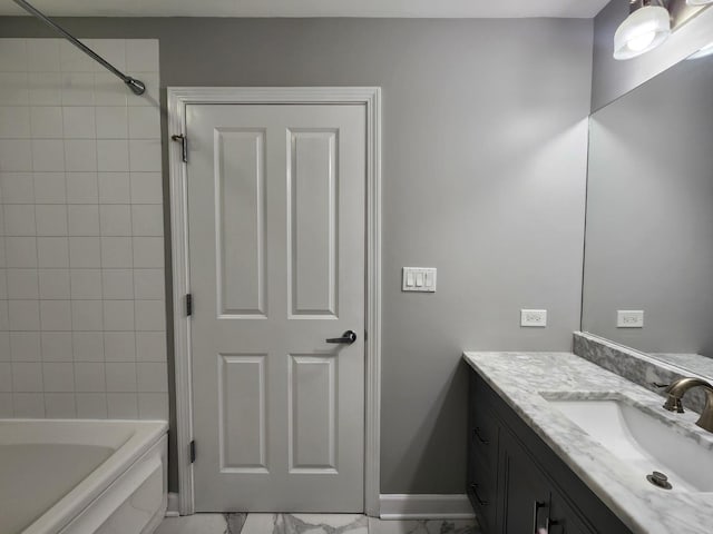 1250 S Michigan Ave Unit 703, Chicago, IL 60605 - bathroom with vanity, marble finish flooring, baseboards, and tub / shower combination