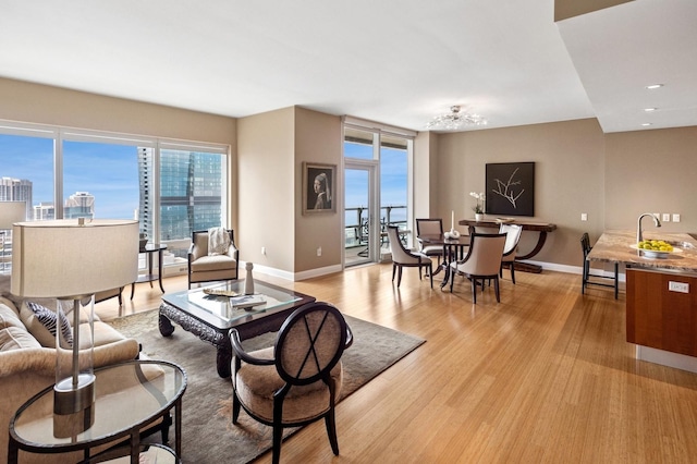 340 E Randolph St Unit 5504, Chicago, IL 60601 - living area with baseboards and light wood finished floors